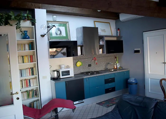 Corte Cavour. Mansarda Nel Cuore Della *